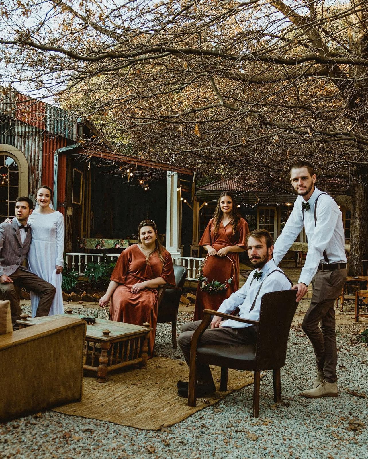 A wedding party gathered in the courtyard